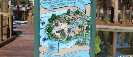 A map sign for the Lowcountry Celebration Discovery Trail with a list of attractions.