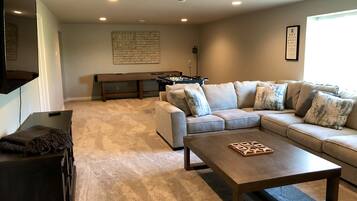 Smart TV, fireplace, foosball