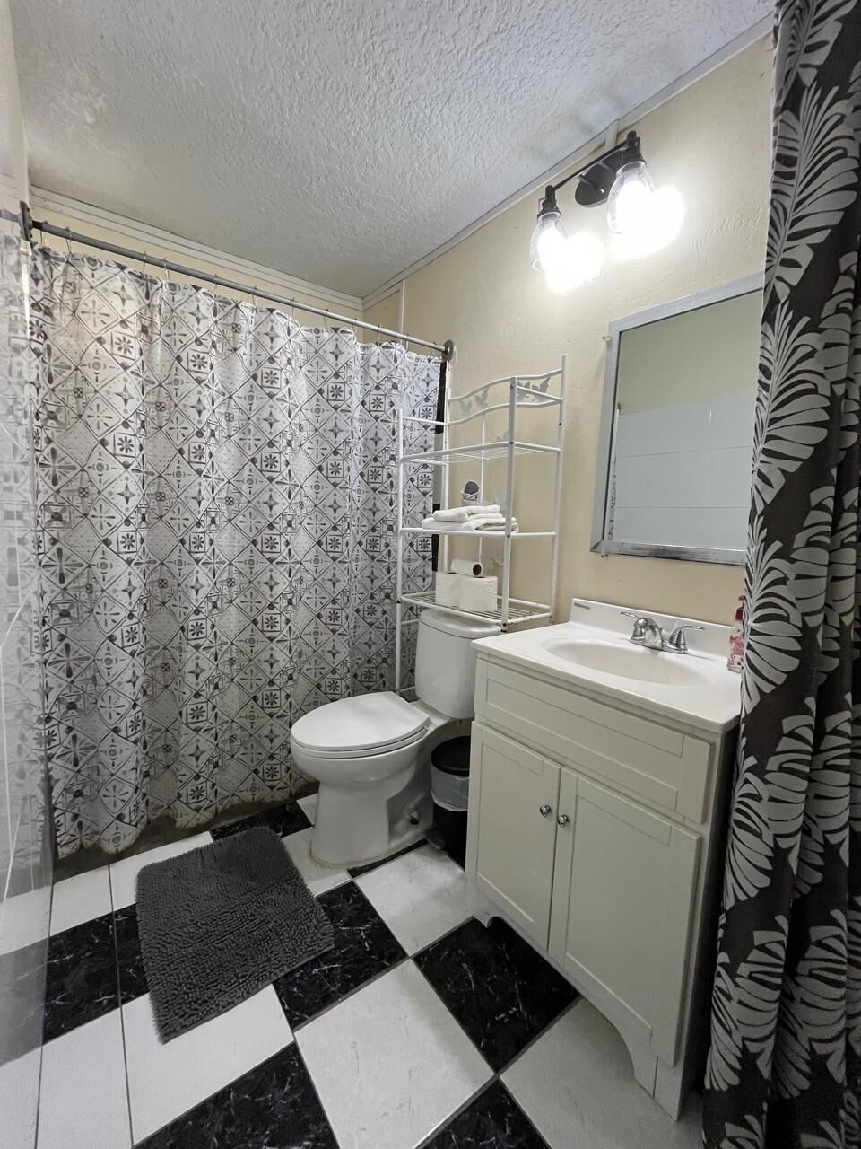 Shower, towels, soap, toilet paper