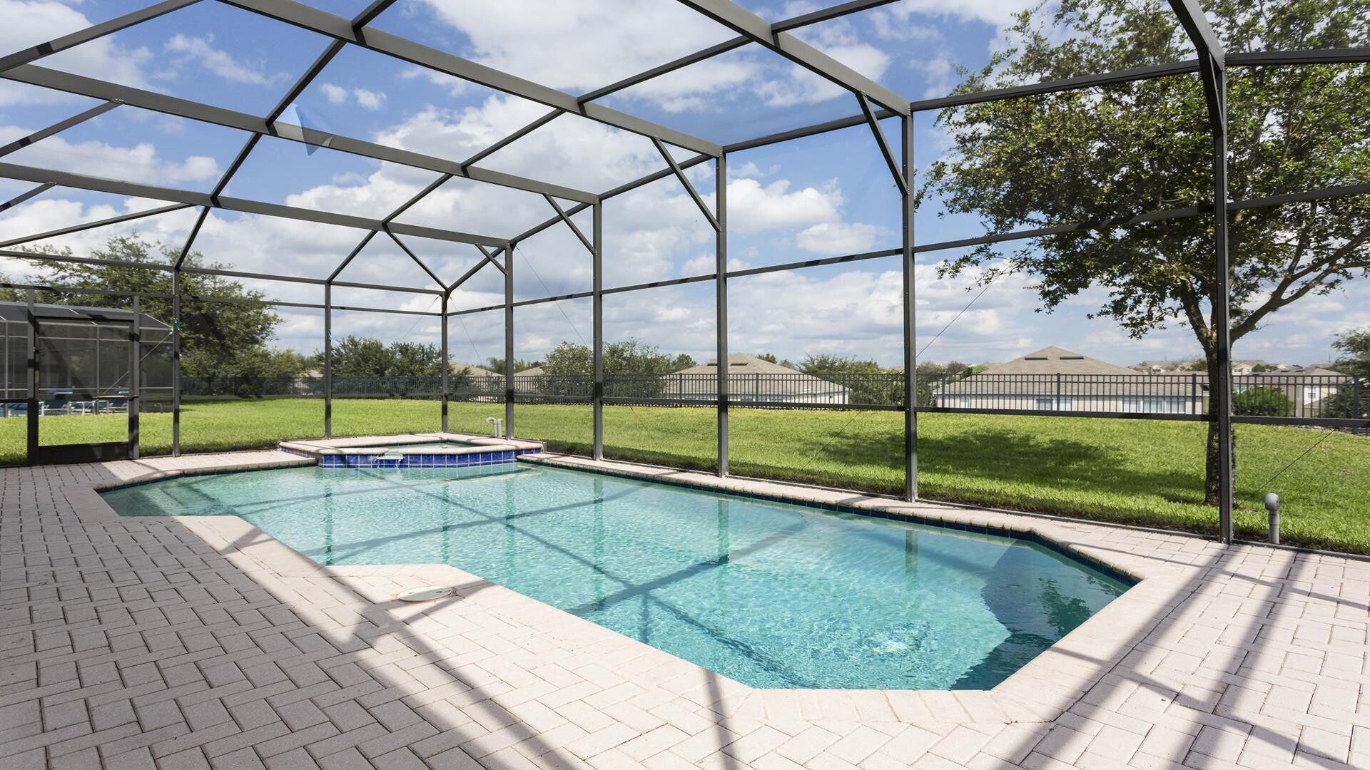 A covered swimming pool with a clear view of the surrounding area.