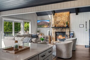 Smart TV, fireplace, foosball, books