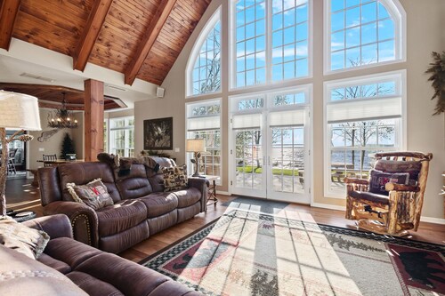 Lakefront retreat with hot tub, water view, game room, home theater & dock