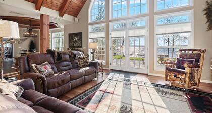 Lakefront retreat with hot tub, water view, game room, home theater & dock