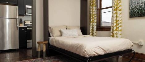 1 habitación, tabla de planchar con plancha, wifi y ropa de cama
