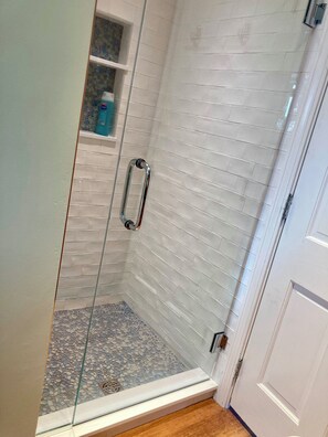 Bathtub, hair dryer, bidet, towels