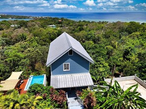 Exterior - Sunset and Ocean views at Sandy Feet Retreat with private infinity pool. (Sandy Bay)