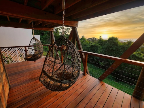 Sunset and Ocean views at Sandy Feet Retreat with private infinity pool.