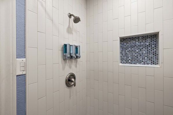 Clean, modern bathroom with essentials provided