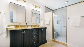 Bathtub, eco-friendly toiletries, hair dryer, towels