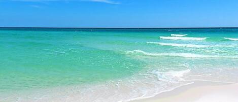 On the beach, sun loungers, beach towels