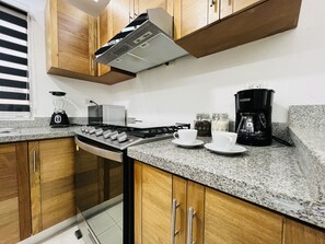 Fridge, microwave, oven, coffee/tea maker
