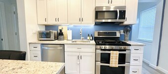 Your Family Friendly Home with Large Backyard & Onsite Parking