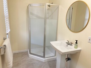 Shower, towels, soap, shampoo