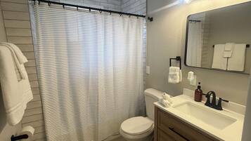 Hair dryer, towels, soap, shampoo