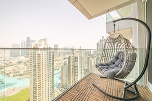 Terrace/patio - Luxury 3BR with Burj Khalifa Views, Pool, Gym, and Free Parking (Downtown)