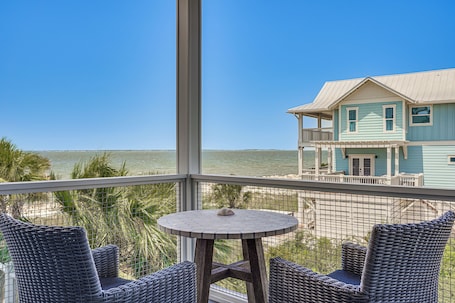 Outdoor dining. Luxe Beachfront WindMark Cottage w/ Deck!