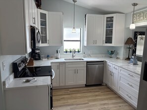Fridge, microwave, oven, stovetop - Treasure Island Beach House 200 yards to Beach and short walk to John's Pass (Treasure Island)