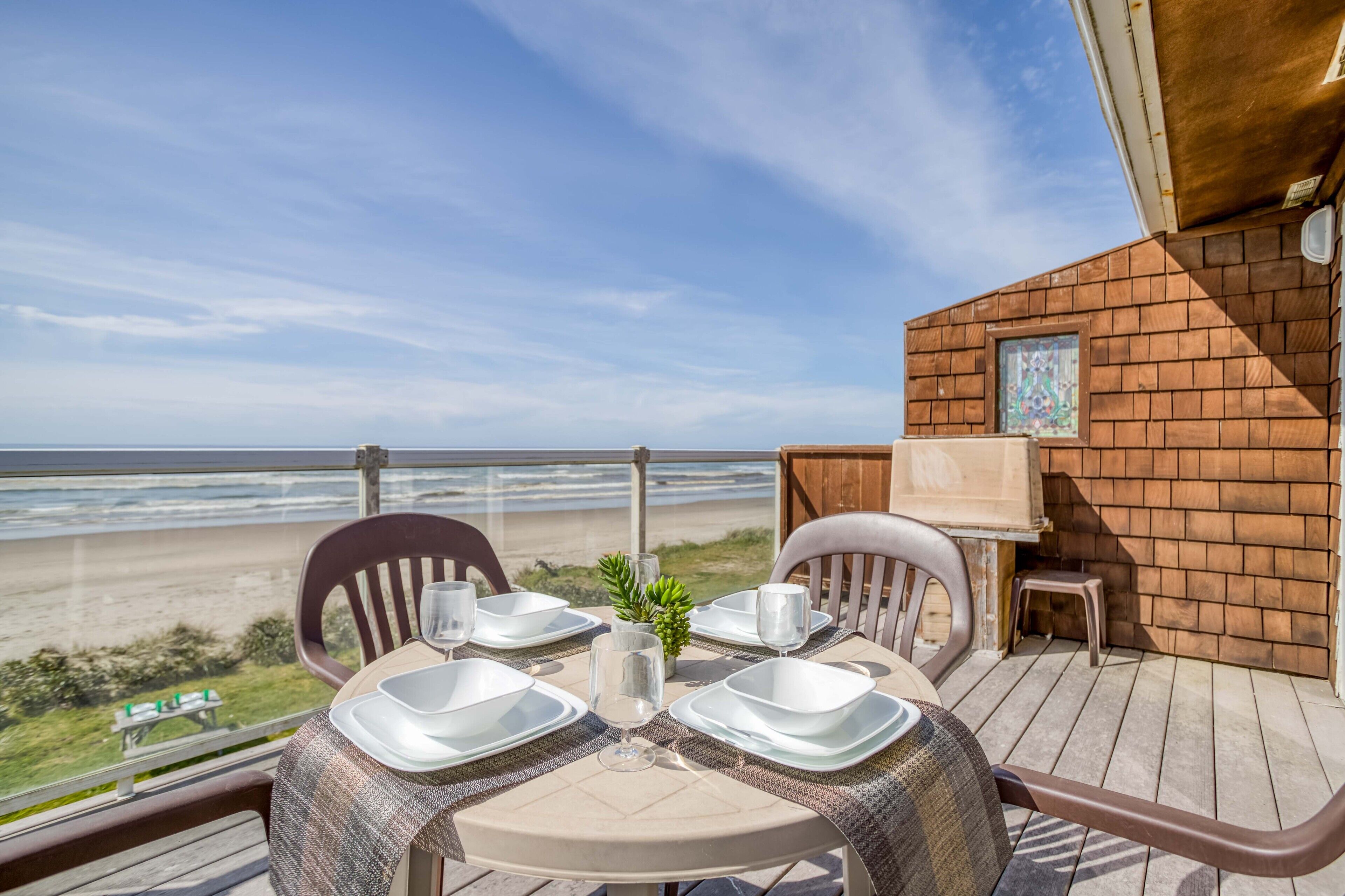 Enjoy Easy Beach Access from this Upstairs Oceanfront Condo in Rockaway Beach!