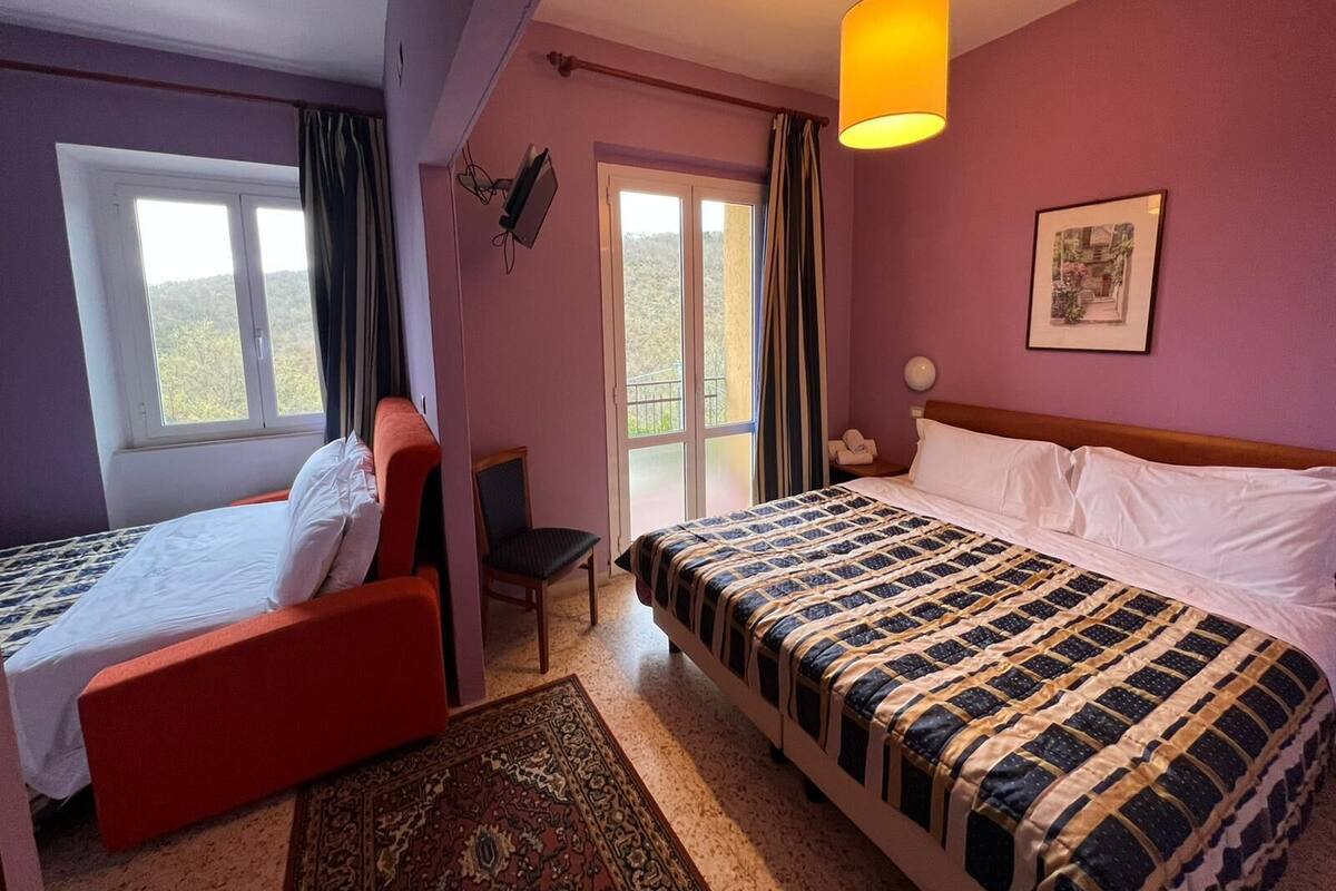 Habitación cuádruple familiar | Wifi gratis y ropa de cama