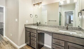 Combined shower/bathtub, hair dryer, towels, soap