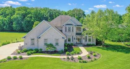 Huge home with theater, hot tub, golf cart, and just minutes from Lambeau Field!
