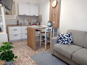 Apartment, 1 Queen Bed | Living area | 30-inch TV with cable channels - Inviting 1-bed Apartment in Ragusa (Ragusa)