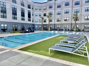 Outdoor pool, a heated pool - HTX LUXURY APARTMENT (Houston)