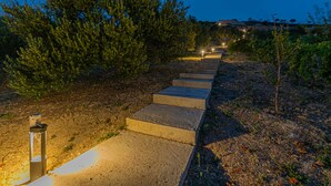 A pathway with steps leading uphill, surrounded by trees and a distant building. - Gorgeous home in Sibenik (Sibenik)