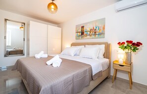 2 habitaciones, tabla de planchar con plancha y cuna de viaje 