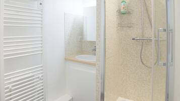Shower, eco-friendly toiletries, hair dryer, towels