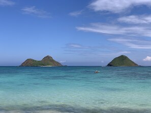 A clear view of two small islands with calm turquoise waters in the foreground. - Bright, upgraded house, A/C, near the ocean! CONTACT FOR RATES & AVAILABILITY! (Kailua)