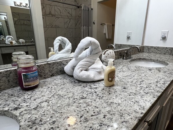 Combined shower/bathtub, hair dryer, towels, soap