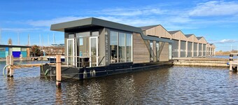 Fantastisk skip i Heeg med utsikt over.