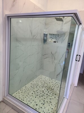 Shower, hair dryer, towels, soap