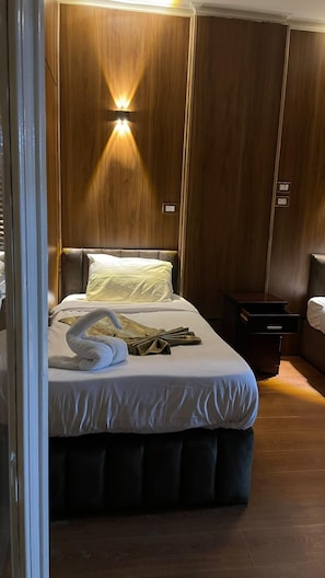 Minibar, fer et planche à repasser, Wi-Fi gratuit, draps fournis