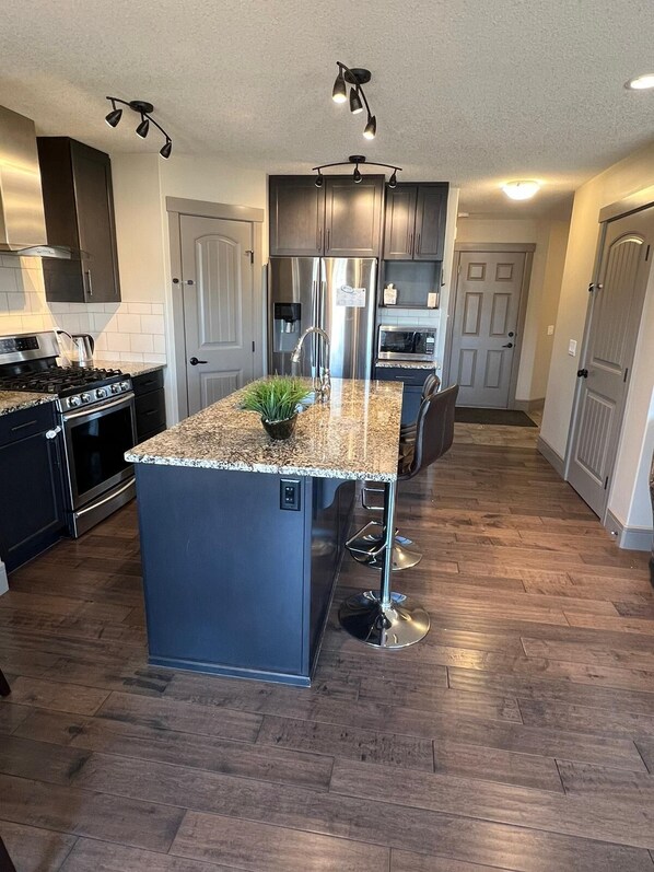 Fridge, microwave, dishwasher, coffee/tea maker