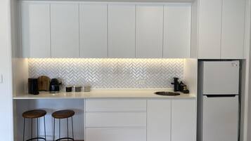 Fridge, microwave, coffee/tea maker, electric kettle