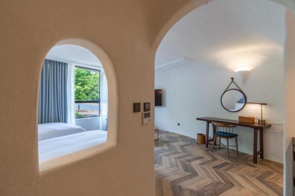 Premium bedding, down duvets, in-room safe, desk