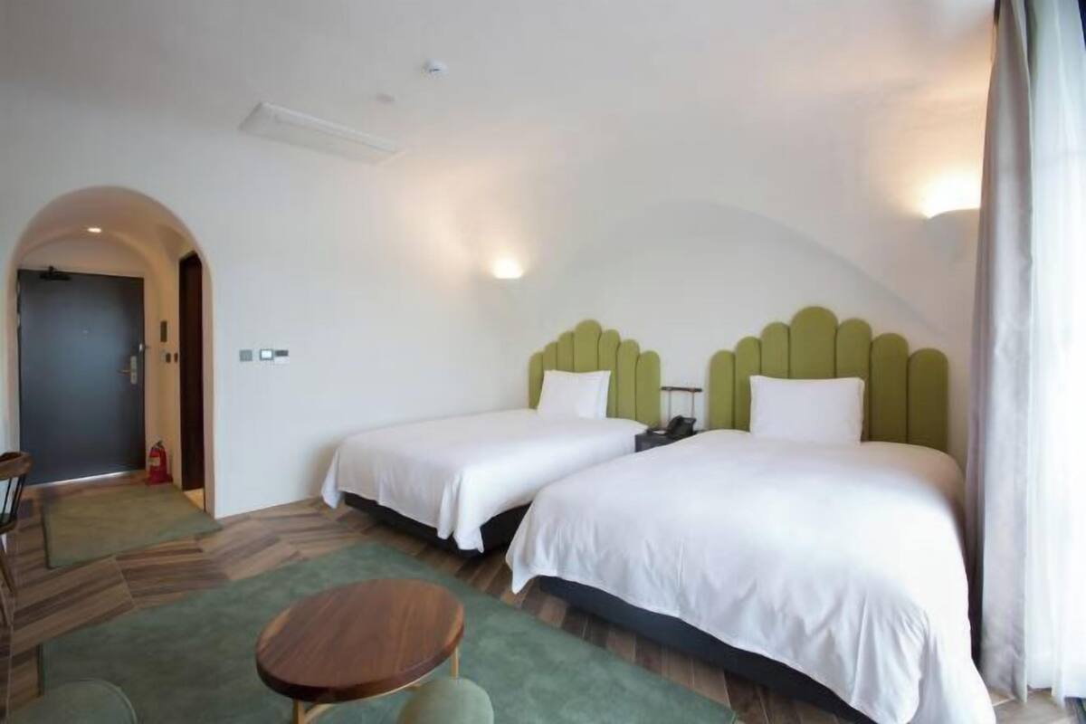 Premium bedding, down duvets, in-room safe, desk