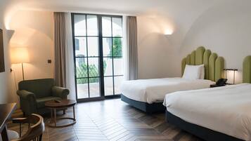 Deluxe Twin Castle | Premium bedding, down comforters, in-room safe, desk