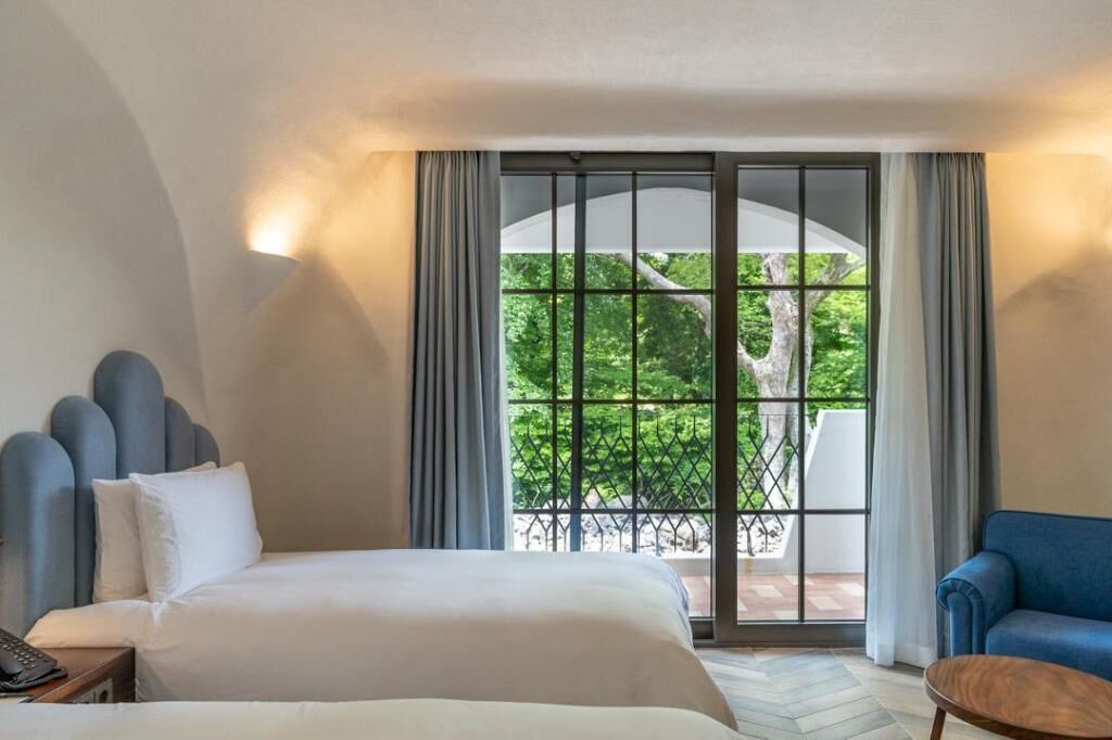 Premium bedding, down duvets, in-room safe, desk