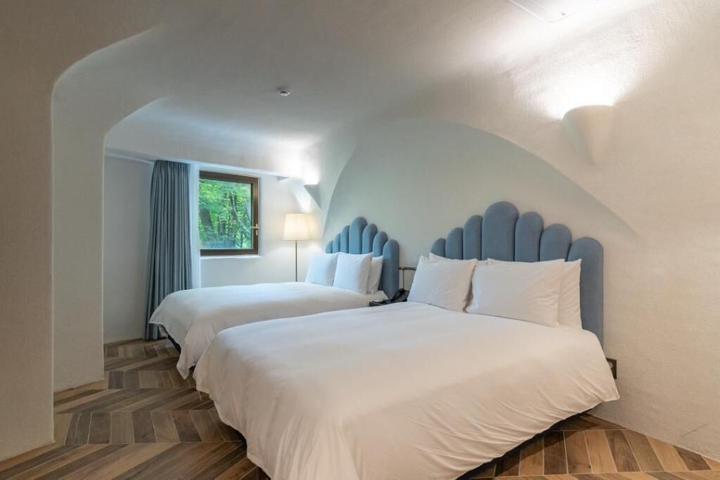 Premium bedding, down duvets, in-room safe, desk