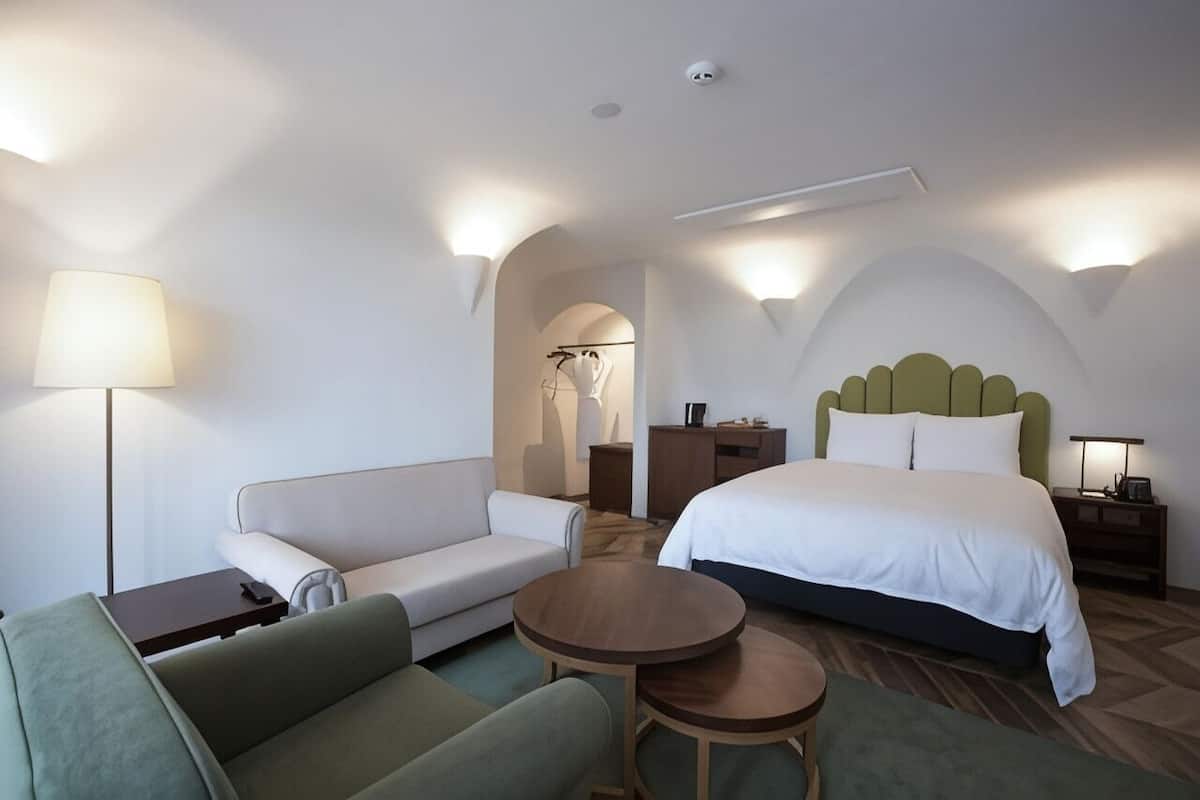 Premium bedding, down duvets, in-room safe, desk