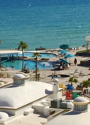 Outdoor pool, a heated pool - LUXURY FULLY REMODEL 1 BEDROOM CONDO @ LAS PALMAS BEACHFRONT RESORT (Puerto Peñasco)