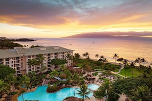 Enjoy breathtaking ocean views from the resort's spacious balconies overlooking the central pool and lush gardens.