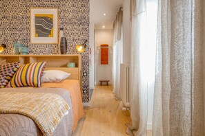 Premium bedding, pillow-top beds, soundproofing, free WiFi