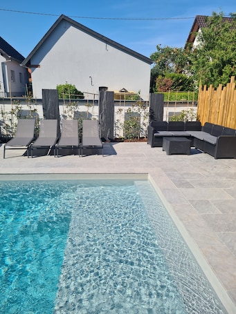 Outdoor pool, a heated pool. Private accommodation in beautiful villa with swimming pool