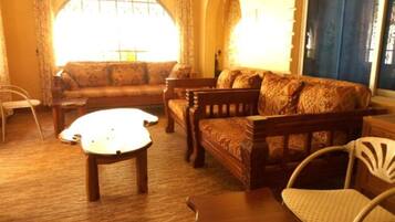 Superior Villa, 3 Bedrooms | Living area | 32-inch flat-screen TV with digital channels, TV