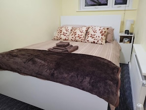 Apartamento, várias camas | 1 quarto, ferros/tábuas de passar roupa, Wi-Fi de cortesia