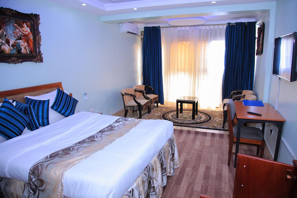 Deluxe Single Room | 1 bilik tidur, peti besi dalam bilik, meja, ruang kerja komputer riba